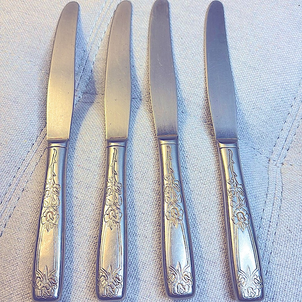 Set of 4 Dinner Knives Rose Tradition" pattern by Sears Roebuck. (Replacements)